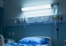 I was resting in my hospital room after giving birth when my 7-year-old son slipped inside, locked the door, and whispered, “Mom, don’t make a sound.”