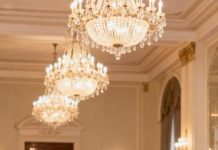 My husband’s relatives chuckled when my dad nervously adjusted the old tie he’d worn for twenty years, but when a stranger approached him during the first dance and addressed him by a title none of them recognized, everything changed