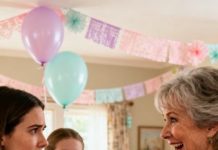 The moment my husband tried to clean the baby blanket my mother-in-law proudly gave me, he froze in shock, and I had to bite my lip to keep from laughing, knowing the hidden truth inside would blow everyone’s minds.