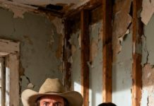 During the renovation of our living room, the workers suddenly halted after opening up one of the old walls.
