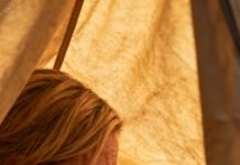 During thanksgiving dinner, i noticed my eight-year-old daughter tucked away beneath the table.