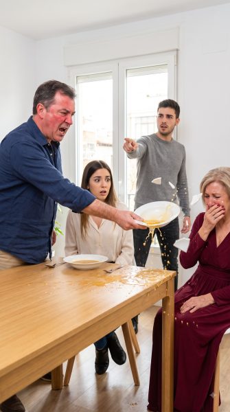 Man_shouting_at_family_dinner_2K_202609051604